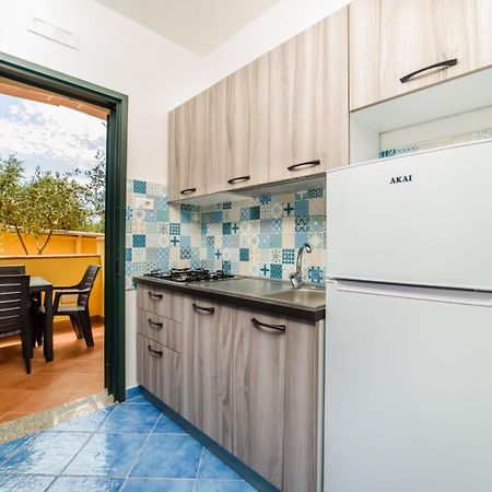 Villaggio Residence Pietra Grigia มารีนาดีกาเมโรตา ภายนอก รูปภาพ