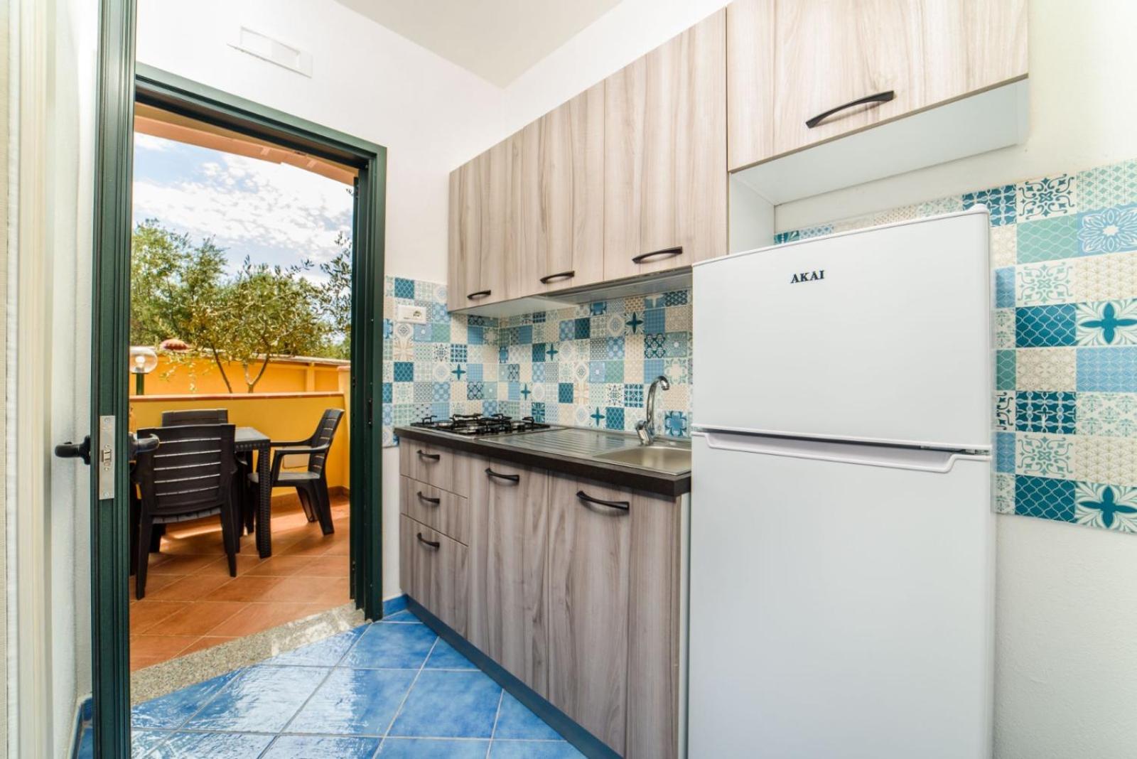Villaggio Residence Pietra Grigia มารีนาดีกาเมโรตา ภายนอก รูปภาพ